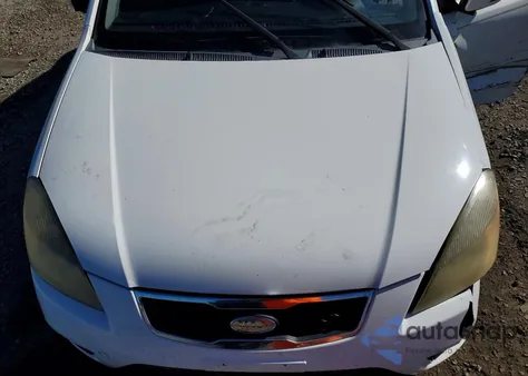 2011 Kia Rio Base z USA, uszkodzony, nr VIN KNADH4A38B6913922